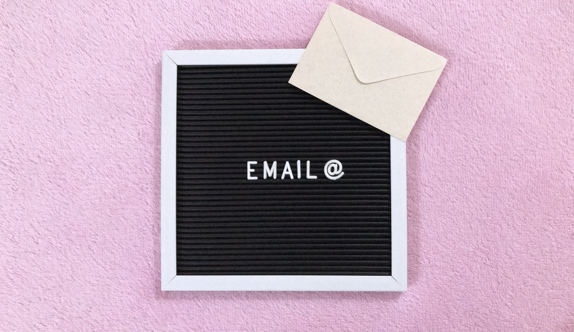 Email sign board on pink background